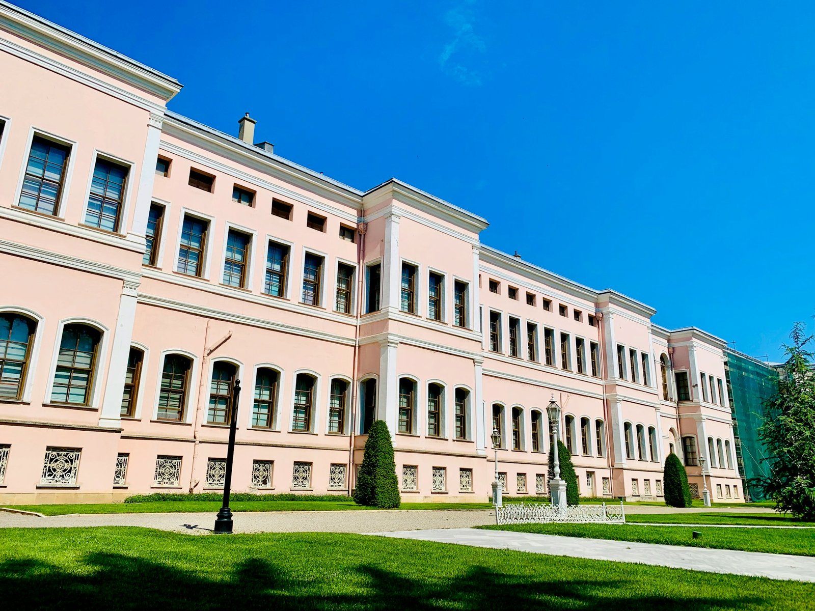 beige concrete building under blue sky during daytime